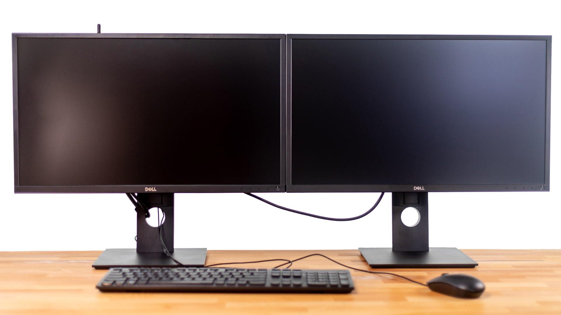 Werkplek opstelling met twee Dell monitoren met daarachter een kleine Dell Optiplex 3080